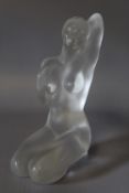 A LALIQUE CRYSTAL KNEELING LADY STATUE, signed to the base 'Lalique France', H 12.5 cm