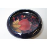 A MOORCROFT POMEGRANATE LOW PIN DISH, impressed marks to the base, Dia. 11 cm