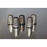 FIVE HALLMARKED SILVER THIMBLES