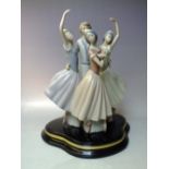 A LARGE LLADRO STYLE BALLET FIGURE GROUP, modelled as three ballet students and their teacher,