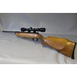 A DIANA SERIES 70 MODEL 79 .22 AIR RIFLE WITH TELESCOPIC SIGHT, wooden stock and having a Diana