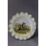 A ROYAL CROWN DERBY CABINET PLATE SIGNED BY J DOYLE, hand painted with a sportsman with his dogs,