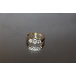 A HALLMARKED 18 CT GOLD THREE STONE DIAMOND RING, ring size O