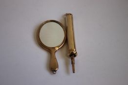 A 9ct GOLD PROPELLING PENCIL and a 9ct gold backed handbag / chatelaine mirror (2)