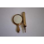 A 9ct GOLD PROPELLING PENCIL and a 9ct gold backed handbag / chatelaine mirror (2)