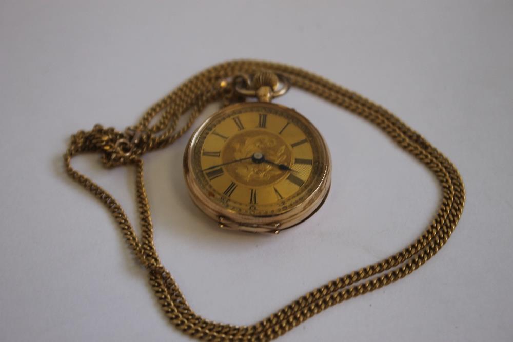 A LATE 19TH CENTURY CONTINENTAL LADIES FOB WATCH (marked 14ct) on a 9ct gold necklace chain.