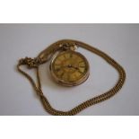 A LATE 19TH CENTURY CONTINENTAL LADIES FOB WATCH (marked 14ct) on a 9ct gold necklace chain.