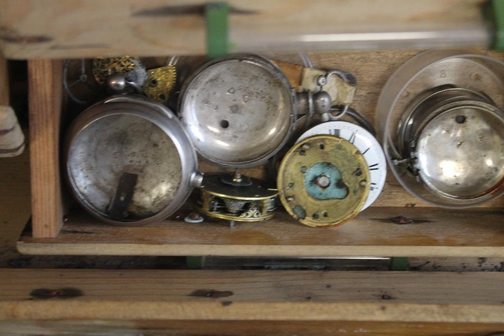 A CABINET OF POCKET WATCH PARTS, to include a selection of verge parts, movements, pair cases - Image 4 of 12
