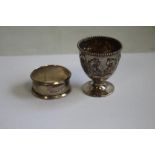 A HALLMARKED SILVER NAPKIN RING and egg cup (2)