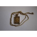 A 9ct GOLD ST CHRISTOPHER INGOT/PENDANT, on a fancy link chain