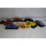 A COLLECTION OF VEHICLES, to include Burago Corgi, Revell etc