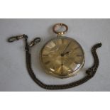 A YELLOW METAL GENTLEMAN'S OPEN FACE KEY WIND POCKET WATCH, gilt dial engraved with a scene of