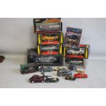 A COLLECTION OF BOXED AND LOOSE DIECAST VEHICLES, to include examples by Burago, Corgi, Vanguards