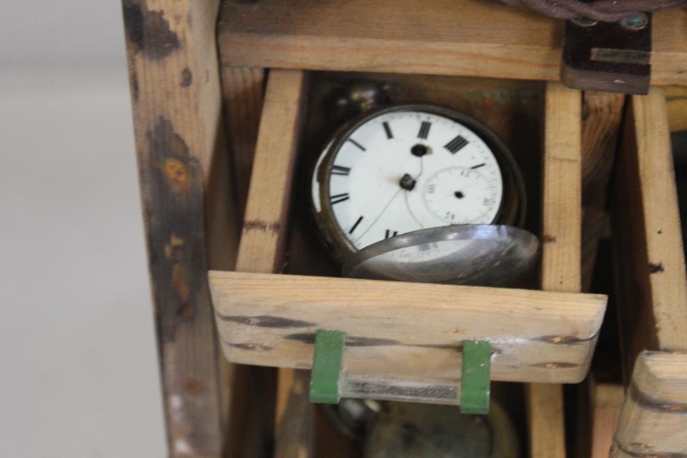 A CABINET OF POCKET WATCH PARTS, to include a selection of verge parts, movements, pair cases - Image 7 of 12