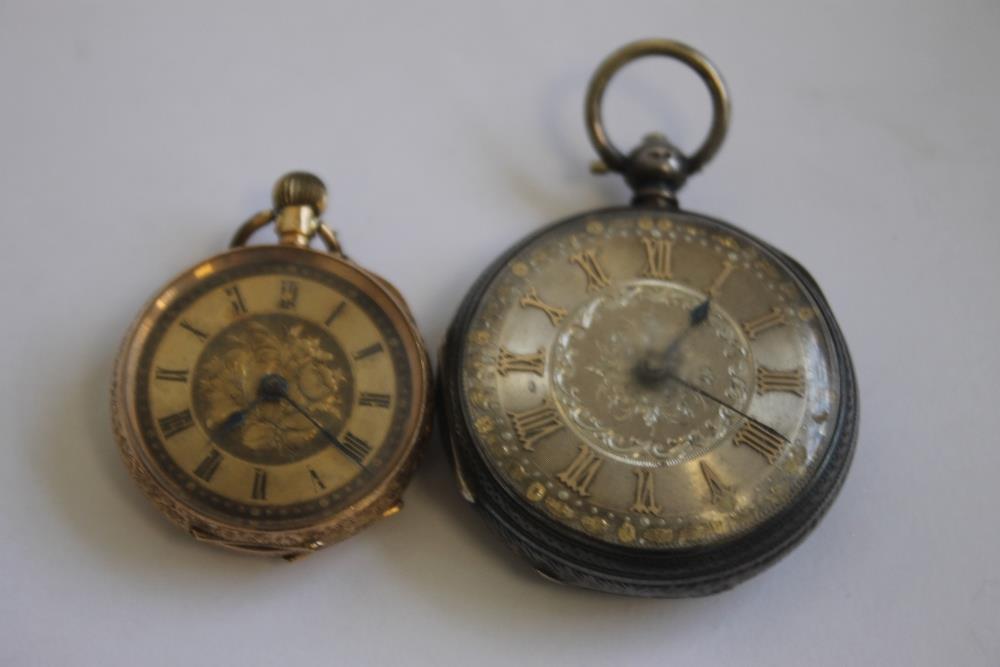 A LATE 19TH CENTURY CONTINENTAL LADIES' FOB WATCH MARKED 14ct, gilt engraved dial with black Roman