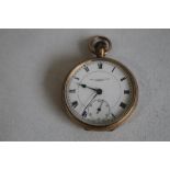 A 9ct GOLD OPEN FACE TOP WIND POCKET WATCH, white enamel dial signed 'Thos Russell and Son