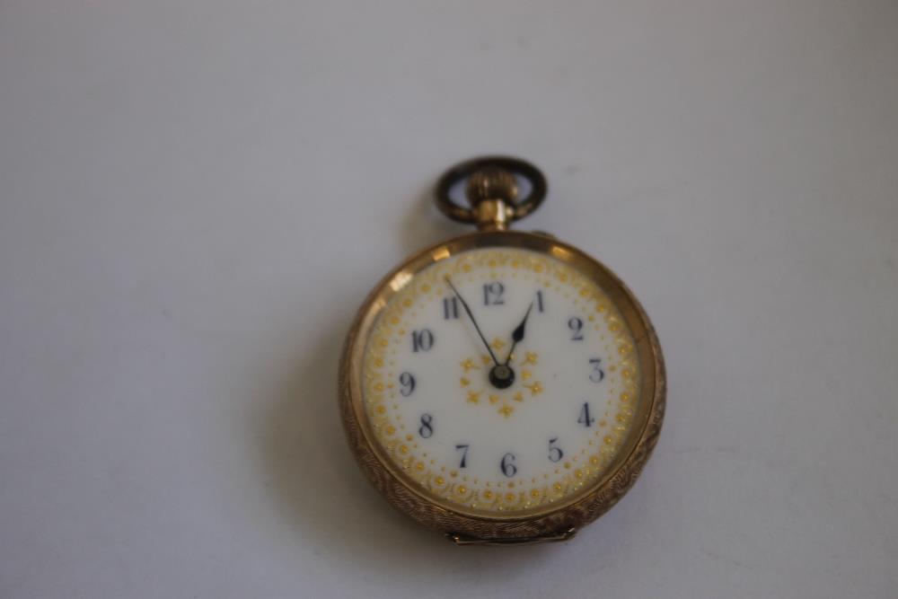 A LADIES CONTINENTAL YELLOW METAL FOB WATCH (MARKED 14ct) white enamel dial with blue Arabic Numeral - Image 2 of 2