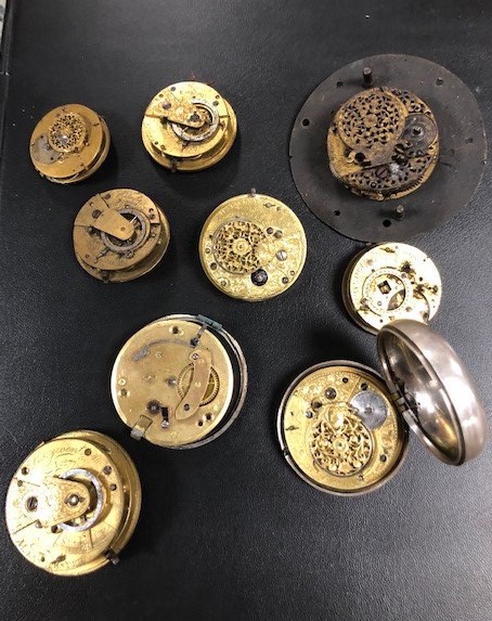 A CABINET OF POCKET WATCH PARTS, to include a selection of verge parts, movements, pair cases - Image 9 of 12