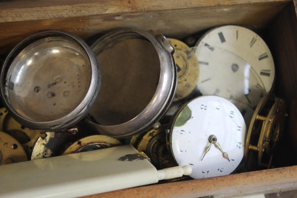 A CABINET OF POCKET WATCH PARTS, to include a selection of verge parts, movements, pair cases - Image 2 of 12