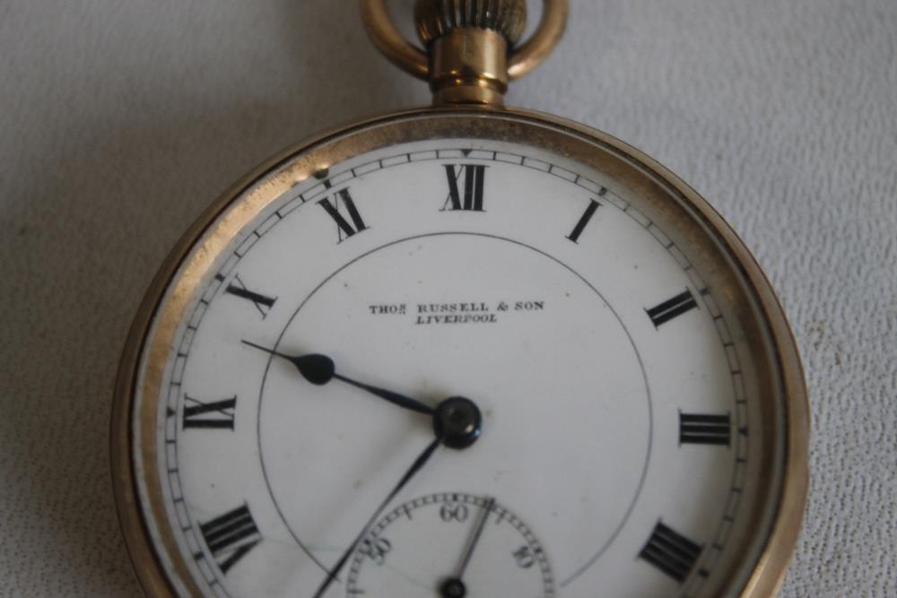 A 9ct GOLD OPEN FACE TOP WIND POCKET WATCH, white enamel dial signed 'Thos Russell and Son - Image 2 of 3