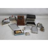 A COLLECTION OF VINTAGE AND RETRO CIGARETTE AND TABLE LIGHTERS, to include a boxed Hudson watch