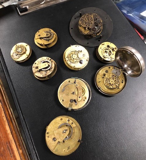 A CABINET OF POCKET WATCH PARTS, to include a selection of verge parts, movements, pair cases - Image 12 of 12