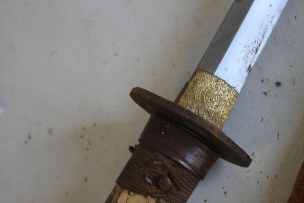 A JAPANESE KATANA SWORD WITH DECORATED IRON SUBA, black lacquer scabbard (with brown leather - Image 3 of 4