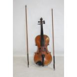 A FRENCH MADE ONE PIECE BACK VIOLIN AND BOW LABELLED A. SALVATOR ALSO INITIALLED J.L.T, A/F