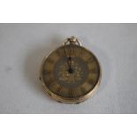 A YELLOW METAL (MARKED 14ct) OPEN FACE FOB WATCH, gilt engraved dial with applied markings.