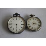 TWO LATE 19TH CENTURY WHITE METAL CASED FOB WATCHES, both with engraved cases.