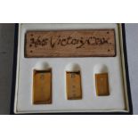 ROYAL MINT HMS VICTORY/ GOLD INGOT SET. consisting of a piece of Victory wood and 3 graduation 9ct