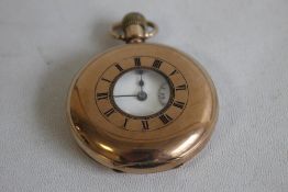 A 9ct GOLD GENTLEMAN'S HALF HUNTER POCKET WATCH, the movement marked "War Rawton English".