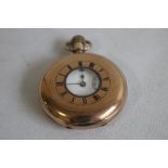 A 9ct GOLD GENTLEMAN'S HALF HUNTER POCKET WATCH, the movement marked "War Rawton English".