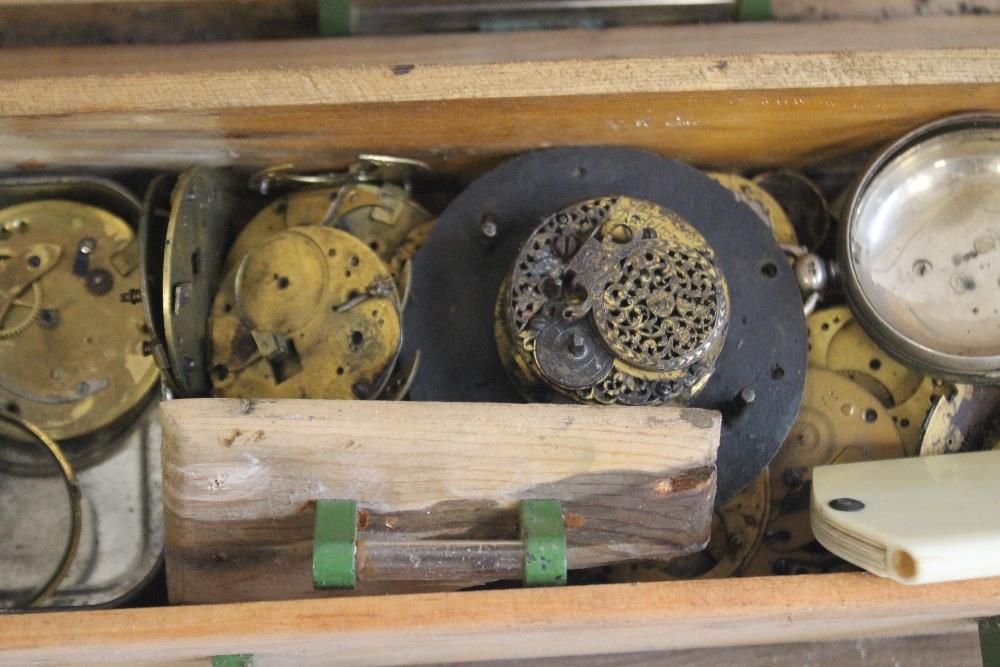 A CABINET OF POCKET WATCH PARTS, to include a selection of verge parts, movements, pair cases - Image 3 of 12