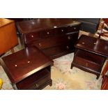 A STAG MINSTREL BEDROOM CHEST TOGETHER WITH PAIR OF BEDSIDES