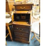 A SMALL REPRODUCTION MAHOGANY CYLINDER DESK H-112 W-52 CM