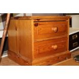 A HONEY PINE TWO DRAWER CHEST