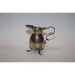 AN ANTIQUE HALLMARKED SMALL SILVER CREAM JUG