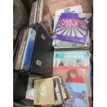 A COLLECTION OF LP RECORDS AND SINGLES TO INCLUDE T.REX, DEPECHE MODE, MADNESS ETC.