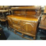 A LARGE CARVED OAK SIDEBOARD CIRCA 1930, W 152 CM