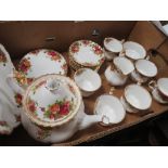 A ROYAL ALBERT OLD COUNTRY ROSES CHINA SIX PERSON TEA SET Condition Report:The teapot has a chip