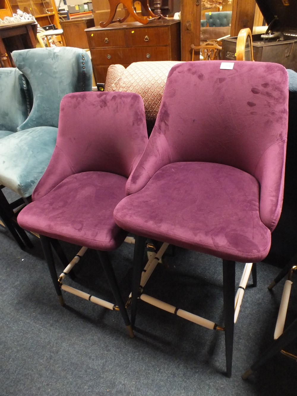 A MODERN UPHOLSTERED VELVET BAR STOOL TOGETHER WITH A SIMILAR EXAMPLE