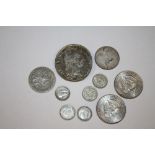 A BAG OF ANTIQUE AND LATER WHITE METAL COINAGE TO INCLUDE A COIN BROOCH A/F