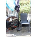 A BLACK GARDEN SET OF 4 CHAIRS, TABLE AND A PARASOL