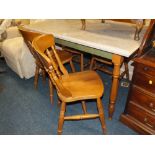 A MODERN KITCHEN TABLE AND FOUR CHAIRS