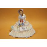 A ROYAL DOULTON 'DAY DREAMS' FIGURE HN 1731