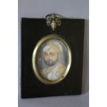 (XIX-XX). Indian school, oval portrait miniature on ivory, study of a bearded man, unsigned,