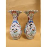 A PAIR OF ORIENTAL BALUSTER VASES WITH FRILLED RIMS, each vase decorated with a figure in a shaped c