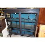 A VINTAGE PAINTED BLUE CHINA DISPLAY CABINET - W 105 CM