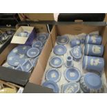 TWO TRAYS OF BLUE WEDGWOOD JASPERWARE TO INCLUDE A BOXED TANKARD